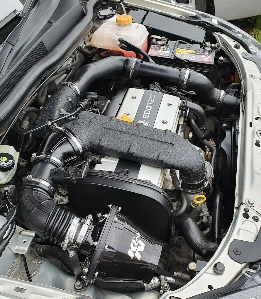 Detailed engine bay work with K&N intake fitted on a serviced engine